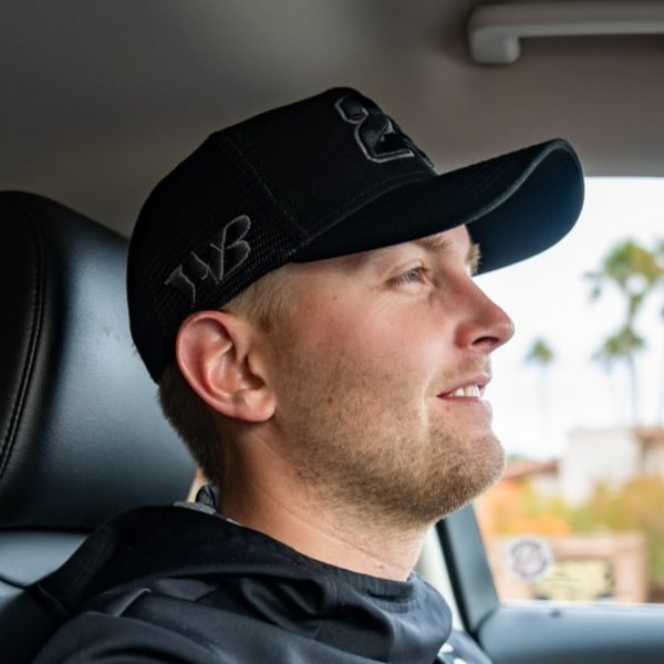 BLACK 24 WB NEW ERA 9FORTY TRUCKER HAT